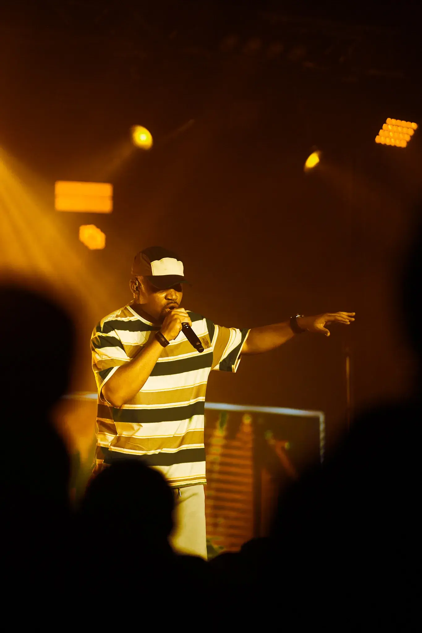 Ko'rale pointing out to the crowd during a performance